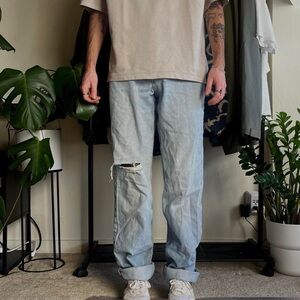 Eddie Bauer - Light wash blue jeans with a baggy, loose, normal fit.